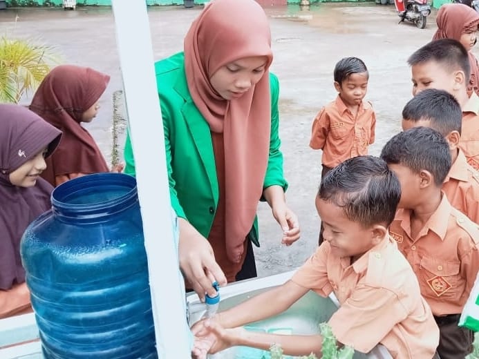 Kegiatan Gerakan Ayo Cuci Tangan di SD Negeri 8 Simpang Keuramat.