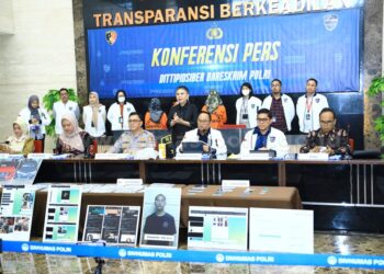 Wadirtipidsiber Bareskrim Polri Kombes Dani Kustoni dalam konferensi pers di gedung Bareskrim, Jakarta Selatan, Selasa (23/7/2024)/ dok. Humas Polri.