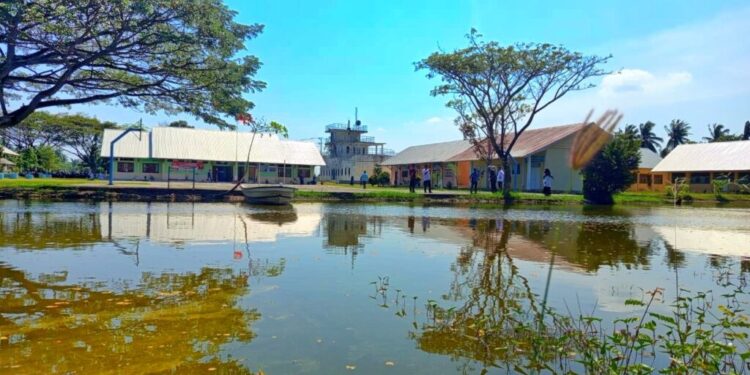 Foto : Danau buatan yang dijadikan tempat praktek siswa jurusan Nautika Kapal Penangkap Ikan (NKPI) di SMKN 1 Muara Batu.