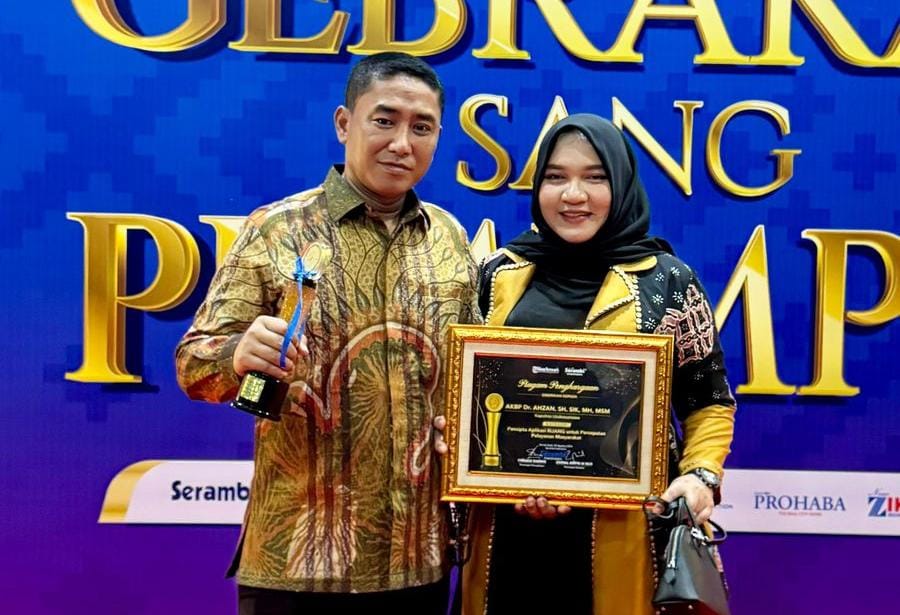 Foto : Kapolres Lhokseumawe AKBP Dr. Ahzan., S.H., S.I.K., M.S.M., M.H didampingi Istri Ny. Ita Ahzan